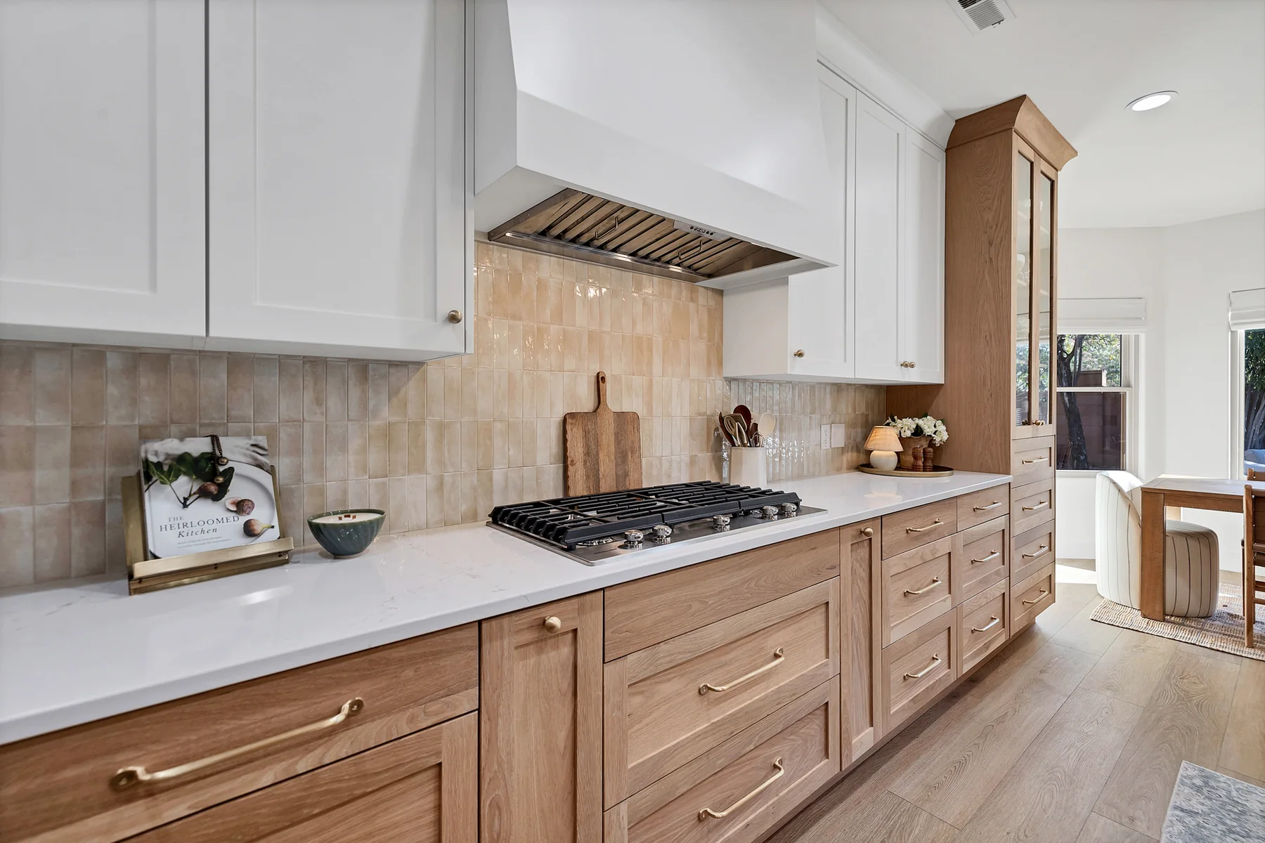 Custom oak kitchen cabinetry and range