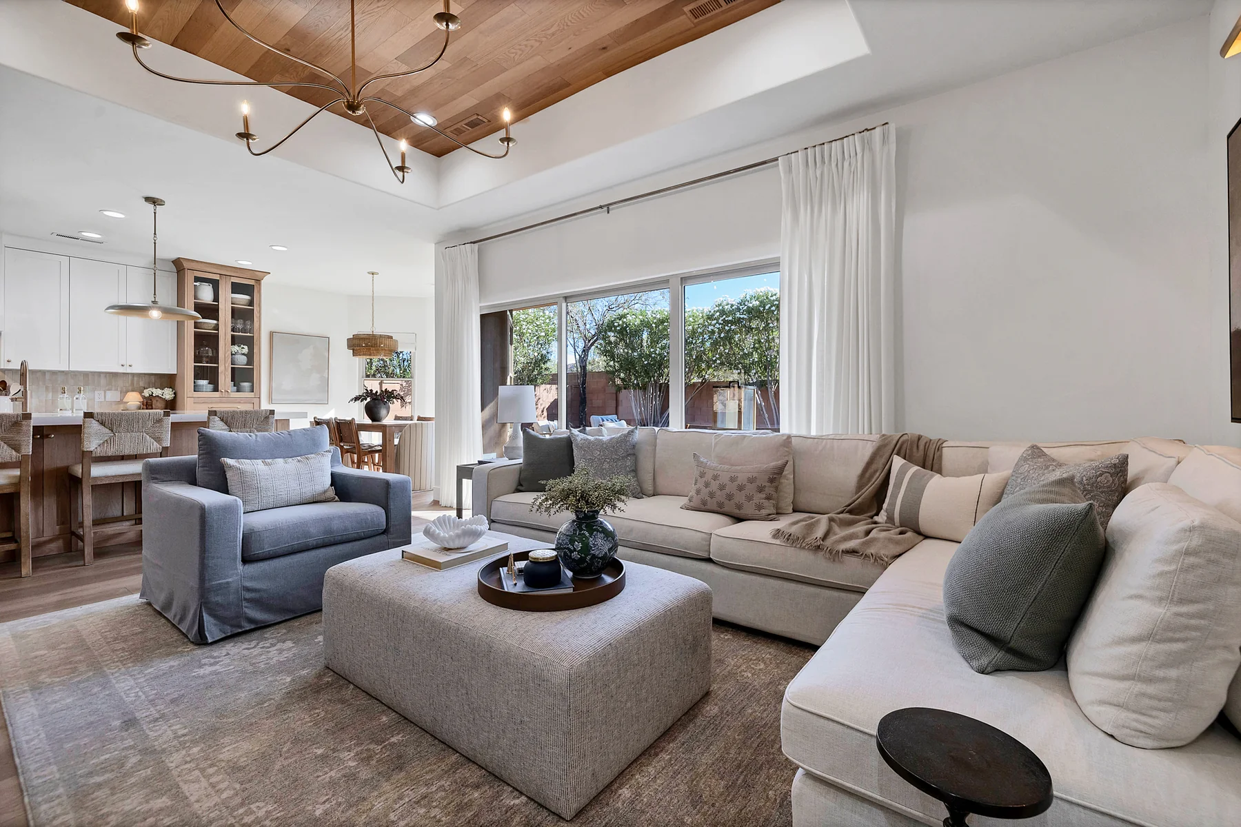 Finished living room with coffered wood ceiling