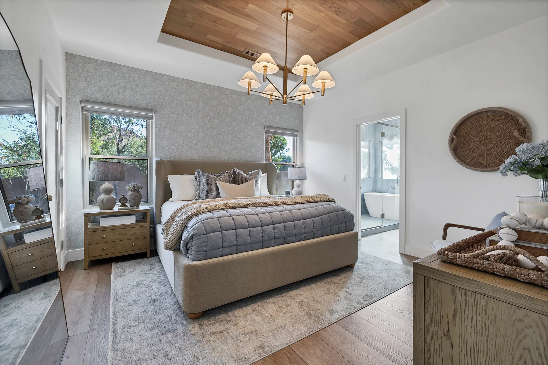 Serene primary bedroom in layered neutrals