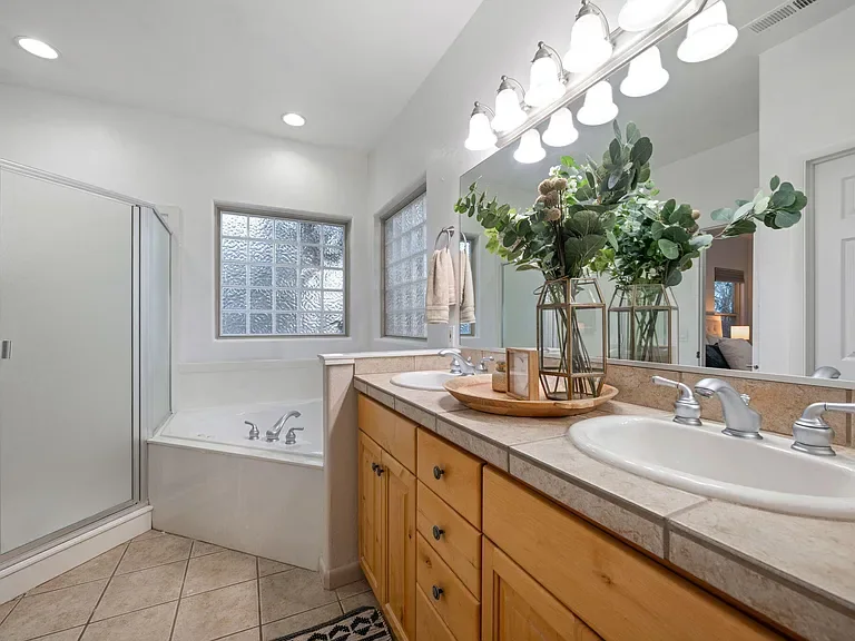 Bathroom with brown cabinets before renovation